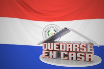 QUEDARSE EN CASA or STAY HOME text in Spanish under open laptop against the Paraguayan flag. Coronavirus self-isolation in Paraguay 3D rendering