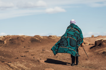 Unidentified Basotho man wearing Lesotho traditional blanket - obrazy, fototapety, plakaty