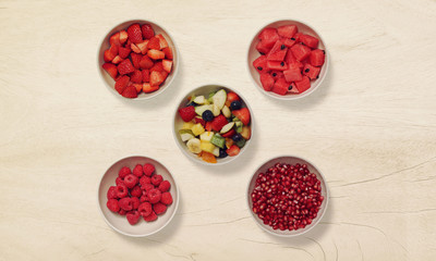 Fresh mixed fruits isolated. Organic food background in a bowl. Healthy eating, Love fruits, clean eating.