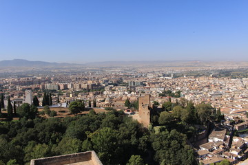 Fototapeta na wymiar Aerial view of the Albaicin city taken from Watch Tower (Torre de la Vela) of the historical Alhambra Palace complex in Granada, Andalusia, Spain.