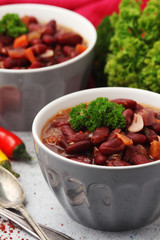 Two bowls with traditional Georgian dish - lobio	