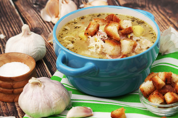 A bowl with traditional Czech garlic soup cesnecka	