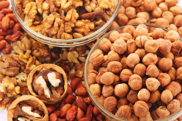 Different nuts in glass cups	