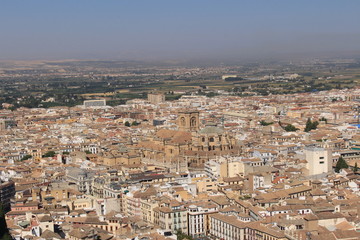 Aerial view of the Albaicin city taken from Watch Tower (Torre de la Vela) of the historical Alhambra Palace complex in Granada, Andalusia, Spain.