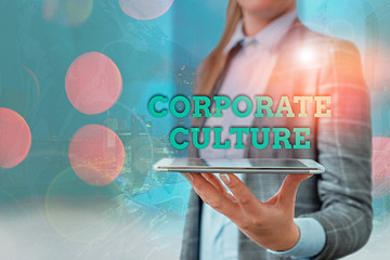 Conceptual hand writing showing Corporate Culture. Concept meaning pervasive values and attitudes...