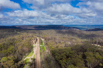 Fototapeta na wymiar A regional railway line running through The Blue Mountains in Australia