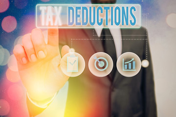 Word writing text Tax Deductions. Business photo showcasing an amount or cost that subtracted from...