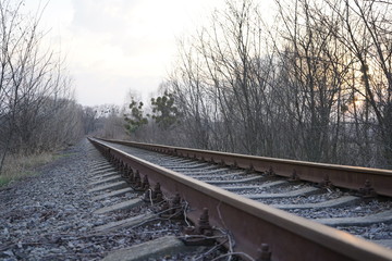 Railroad track, rails and railway sleepers.