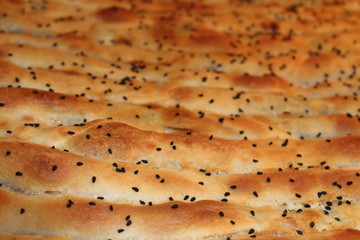  Famous Turkish pastry (Turkish borek) with spinach and black cumin on top.