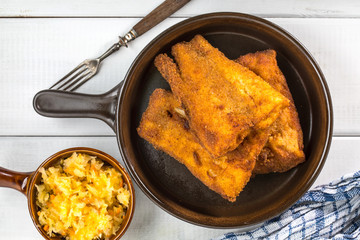 Pieces of cod in breadcrumbs.