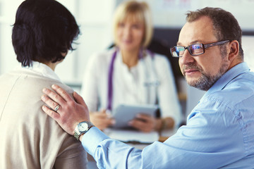 Fototapeta premium Smiling medical doctor and patient. Health care