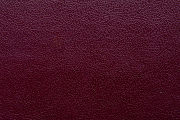 Fototapeta premium The texture of the old red leather. Red leather texture background
