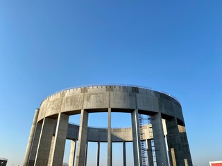 building with blue sky and clouds