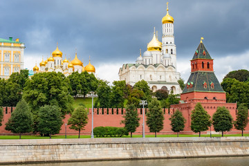 Fototapeta na wymiar Moscow. Russia. The walls of the Kremlin. Temples in the Moscow Kremlin. Ivan the Great belltower. Sights of the capital. Moscow in summer weather. Orthodox churches of Russia. Capital tour