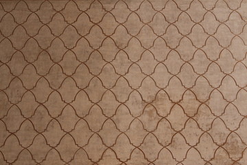 Historical Arabic wall pattern at Nasrid Palaces (Palacios Nazaries) at Alhambra Palace and...