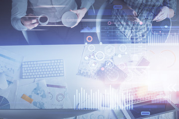 Double exposure of man and woman working together and data theme hologram drawing. Computer background. Top View.