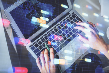 Double exposure of woman hands working on computer and data theme hologram drawing. Top View. Technology concept.