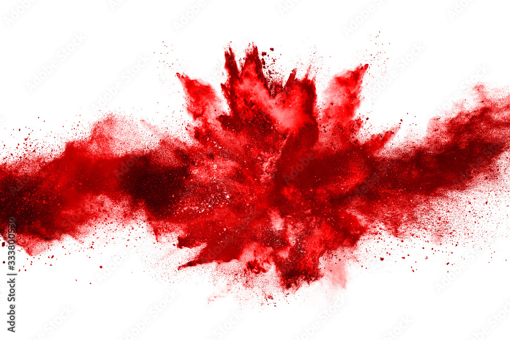 Wall mural freeze motion of red powder exploding, isolated on white background. abstract design of red dust clo