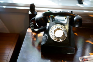 Old retro black house phone - Powered by Adobe