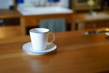 Table and empty tea cup