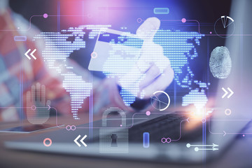 Double exposure of man hands holding a credit card and world map drawing. International Internet E-commerce and technology concept.
