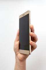 woman hand holding smartphone vertical on the white background