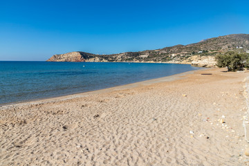Fototapeta na wymiar Sand and cliffs in Provatas beach