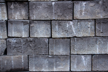 gray brick with white spots closeup background