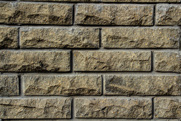 Golden brick textured background close-up
