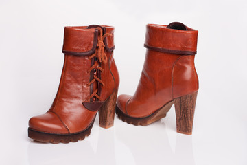 Women stylish modern shoes on white background