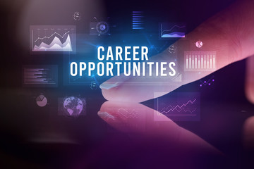 Finger touching tablet with charts and CAREER OPPORTUNITIES inscription, business concept