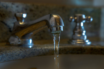 water flowing from faucet