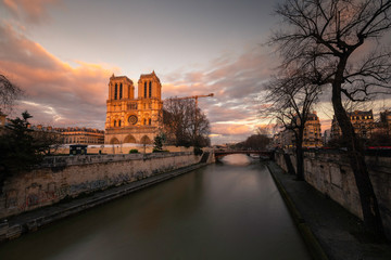 La Cathédrale Notre-Dame de Paris at the Seine river side in Paris, France.