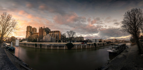 La Cathédrale Notre-Dame de Paris at the Seine river side in Paris, France.