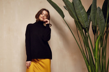 Portrait fashion model brunette hair wear yellow silk dress skirt black top accessory clothes for...