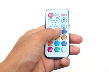 Hand holding remote control, tv remote control in hand isolate on white background - with clipping path