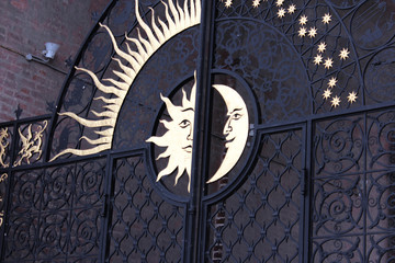 Wrought iron gates, with moon and sun. Syuyumbike tower, Kazan city