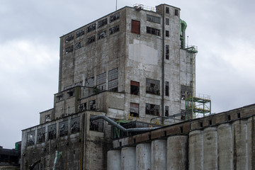 Fototapeta na wymiar old industrial buildings in harbour