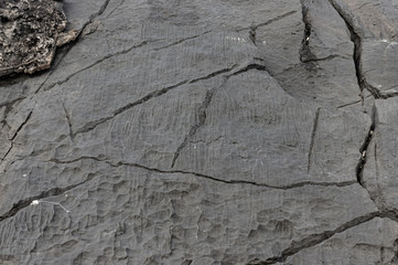 black, graphite texture, flat stone with cracks