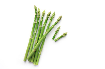 Isolated green fresh sliced asparagus. Top view. 