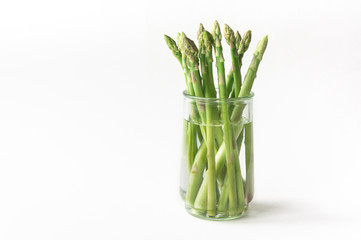 Fresh green asparagus on white background