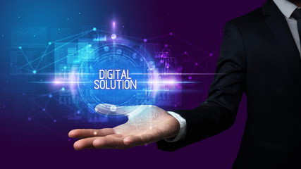 Obraz premium Man hand holding DIGITAL SOLUTION inscription, technology concept