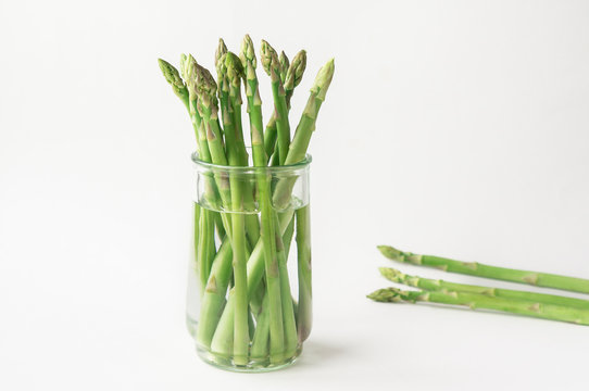 Fresh green asparagus on white background. 