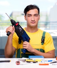 Construction worker sitting at the desk