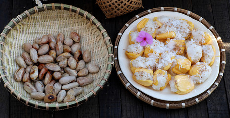 Close up plate of sticky jackfruit and seed basket for breakfast