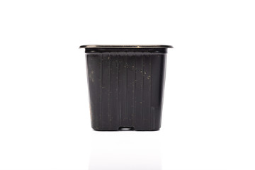 used black plastic gardening bucket