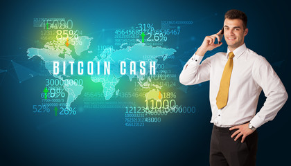 Businessman in front of a decision with BITCOIN CASH inscription, business concept