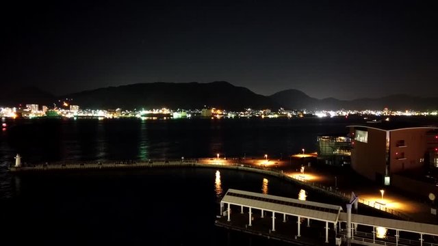 Night view of the harbor along the strait