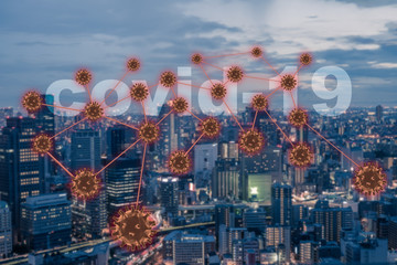 Double exposure of pandemic of Coronavirus over cityscape. The COVID-19 is affecting many countries and territories around the world