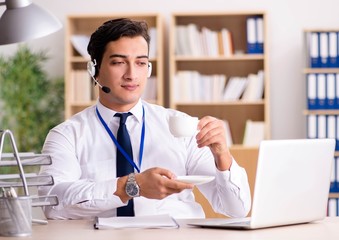 Handsome customer service clerk with headset